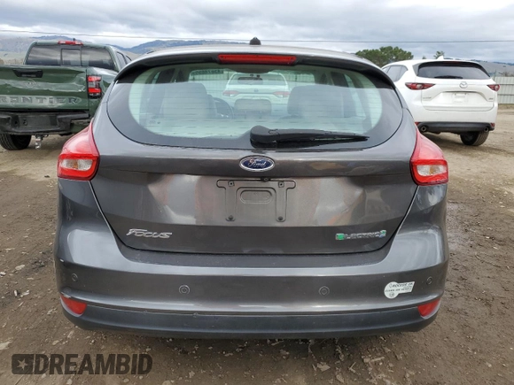 2016 Ford Focus Electric z VIN 1FADP3R45GL221550, wystawiony jako Copart lot #43874655 z przebiegiem 70 651 mil mil oraz Szkody całkowita. Historia ofert i sprzedaży dostępna na DreamBid. Obrazek 6.