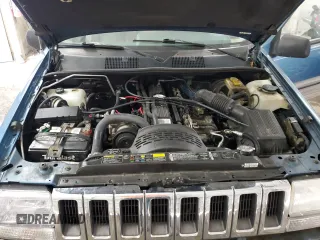 1994 Jeep Grand Cherokee Laredo with VIN 1J4FX58S0RC316030, listed as a Copart auction lot 66178754 with 281,785 mi miles and Salvage Title. Bid and sale history available at carsss.com. Image 12.