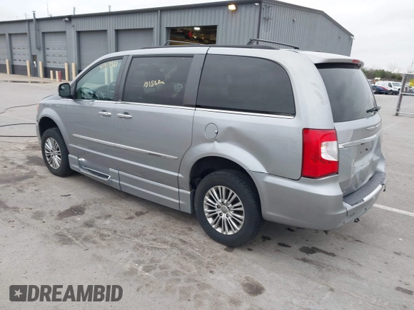 2013 Chrysler Town & Country Touring-L with VIN 2C4RC1CG0DR684329, listed as a IAAI auction lot 41919921 with 101,868 mi miles. Bid and sale history available at carsss.com. Image 3.