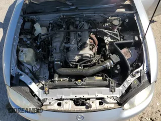 1999 Mazda MX-5 Miata z VIN JM1NB3538X0112611, wystawiony jako Copart lot #54732095 z przebiegiem 173 763 mil mil oraz Szkoda całkowita • Salvage title. Historia ofert i sprzedaży dostępna na DreamBid. Obrazek 11.