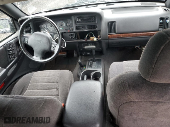 1998 Jeep Grand Cherokee Laredo with VIN 1J4GZ58SXWC144437, listed as a Copart auction lot 60437094 with 183,908 mi miles and Salvage Title. Bid and sale history available at carsss.com. Image 8.