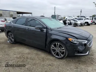 2019 Ford Fusion Titanium with VIN 3FA6P0K97KR254492, listed as a Copart auction lot 54978445 with 99,278 mi miles and Salvage title. Bid and sale history available at DreamBid. Image 4.
