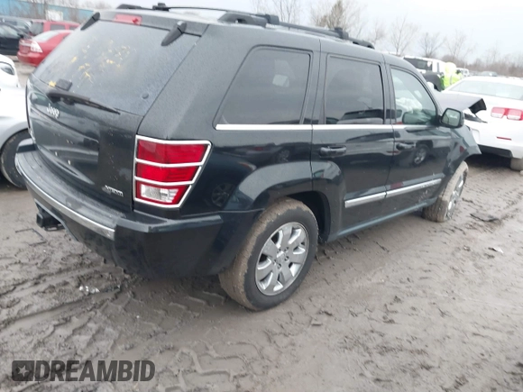 2009 Jeep Grand Cherokee Limited with VIN 1J8HR58T89C541970, listed as a IAAI auction lot 41189623 with 74,161 mi miles. Bid and sale history available at carsss.com. Image 4.