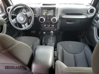 2016 Jeep Wrangler Unlimited Sahara с VIN 1C4BJWEG5GL221827, выставлен на аукционе Copart как лот 60411625 с пробегом 65 405 миль миль и Списание • Salvage title. История ставок и продаж доступна на DreamBid. Изображение 8.