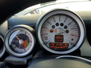 2010 MINI Convertible with VIN WMWMR3C55ATU97172, listed as a Copart auction lot 42726215 with 99,164 mi miles and Salvage Title. Bid and sale history available at DreamBid. Image 9.