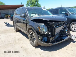 2025 Kia Telluride S with VIN 5XYP6DGC0SG614158, listed as a IAAI auction lot 42314282 with 1,409 mi miles and . Bid and sale history available at DreamBid. Image 1.