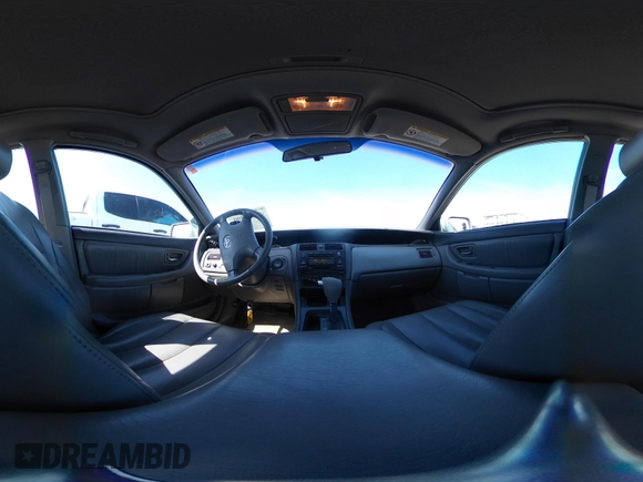 2002 Toyota Avalon XL with VIN 4T1BF28B52U265710, listed as a IAAI auction lot 42102300 with 99,901 mi miles and . Bid and sale history available at DreamBid. Image 19.