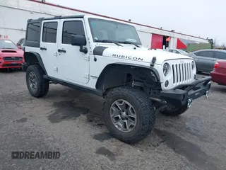 2014 Jeep Wrangler Unlimited Rubicon with VIN 1C4BJWFGXEL283929, listed as a IAAI auction lot 41812052 with 137,790 mi miles. Bid and sale history available at carsss.com. Image 1.