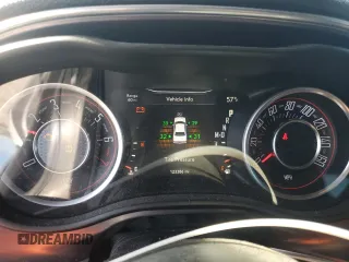 2015 Dodge Challenger SXT with VIN 2C3CDZAG5FH710411, listed as a Copart auction lot 81759714 with 123,386 mi miles and Salvage Title. Bid and sale history available at carsss.com. Image 9.
