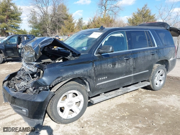 2019 Chevrolet Tahoe LT with VIN 1GNSKBKC9KR336743, listed as a IAAI auction lot 41445798 with 92,274 mi miles. Bid and sale history available at carsss.com. Image 2.