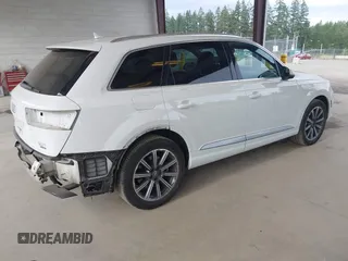 2017 Audi Q7 Premium with VIN WA1AAAF74HD006104, listed as a IAAI auction lot 42554741 with 95,276 mi miles and . Bid and sale history available at DreamBid. Image 4.