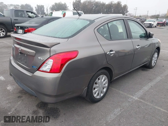2015 Nissan Versa S Plus with VIN 3N1CN7AP9FL810597, listed as a IAAI auction lot 41681629 with 133,777 mi miles. Bid and sale history available at carsss.com. Image 4.