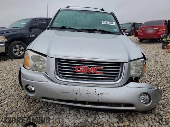 2009 GMC Envoy SLE with VIN 1GKDS33S492129469, listed as a Copart auction lot 83232024 with 131,735 mi miles and Salvage Title. Bid and sale history available at carsss.com. Image 5.
