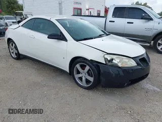 2007 Pontiac G6 GT with VIN 1G2ZH36N574223839, listed as a IAAI auction lot 41484521 with 104,714 mi miles. Bid and sale history available at carsss.com. Image 1.