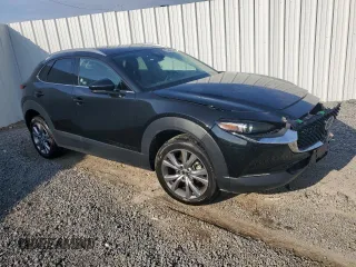 2023 Mazda CX-30 S Premium with VIN 3MVDMBDM8PM527420, listed as a Copart auction lot 44121945 with 29,659 mi miles and Salvage Title. Bid and sale history available at DreamBid. Image 4.