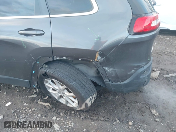 2016 Jeep Cherokee Latitude z VIN 1C4PJMCB4GW141886, wystawiony jako IAAI lot #41215064 z przebiegiem 122 794 mil mil oraz . Historia ofert i sprzedaży dostępna na DreamBid. Obrazek 6.