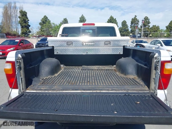 2003 Mazda B-Series 2WD Truck SX with VIN 4F4YR12D53TM11564, listed as a IAAI auction lot 42028399 with 218,402 mi miles. Bid and sale history available at carsss.com. Image 8.