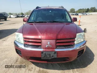 2004 Mitsubishi Endeavor XLS z VIN 4A4MN31S74E038072, wystawiony jako Copart lot #70695594 z przebiegiem 156 053 mil mil oraz Szkoda całkowita • Salvage title. Historia ofert i sprzedaży dostępna na DreamBid. Obrazek 5.
