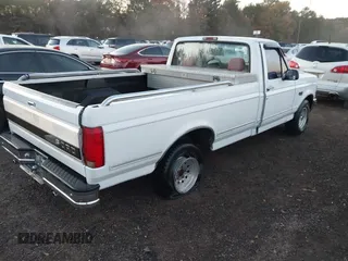 1995 Ford F-150 with VIN 2FTEF15N5SCA07150, listed as a IAAI auction lot 41001619 with 182,542 mi miles. Bid and sale history available at carsss.com. Image 4.