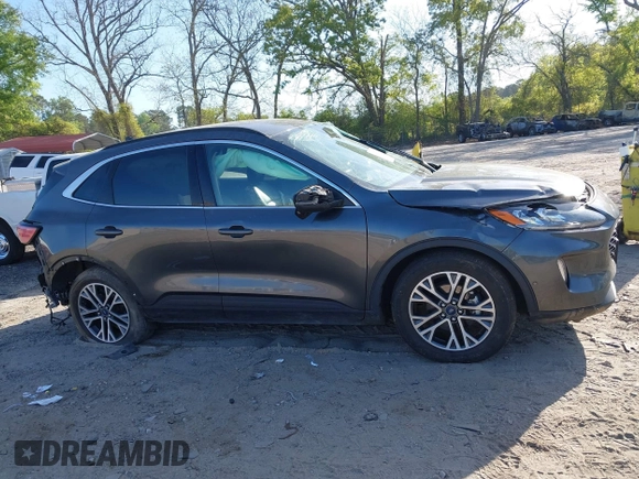 2020 Ford Escape Titanium Hybrid with VIN 1FMCU9DZ2LUA86600, listed as a IAAI auction lot 42059830 with 76,998 mi miles and . Bid and sale history available at DreamBid. Image 12.