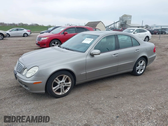 2006 Mercedes-Benz E-Class 3.5L with VIN WDBUF56J56A970327, listed as a IAAI auction lot 41992530 with 138,782 mi miles. Bid and sale history available at carsss.com. Image 2.