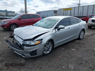2019 Ford Fusion Hybrid SE with VIN 3FA6P0LU9KR104886, listed as a IAAI auction lot 41742835 with 1 mi miles. Bid and sale history available at carsss.com. Image 2.