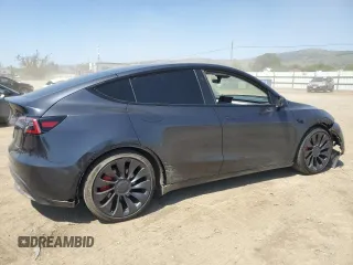 2024 Tesla Model Y Performance z VIN 7SAYGDEF0RF024089, wystawiony jako Copart lot #53981865 z przebiegiem Nie podano mil oraz Szkoda całkowita • Salvage title. Historia ofert i sprzedaży dostępna na DreamBid. Obrazek 3.