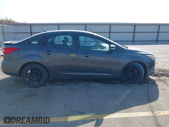2016 Ford Focus SE with VIN 1FADP3F2XGL317130, listed as a IAAI auction lot 41970029 with 85,241 mi miles and . Bid and sale history available at DreamBid. Image 13.