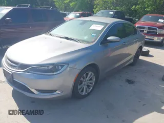 2015 Chrysler 200 Limited with VIN 1C3CCCAB1FN656181, listed as a IAAI auction lot 42011014 with 293,897 mi miles. Bid and sale history available at carsss.com. Image 2.