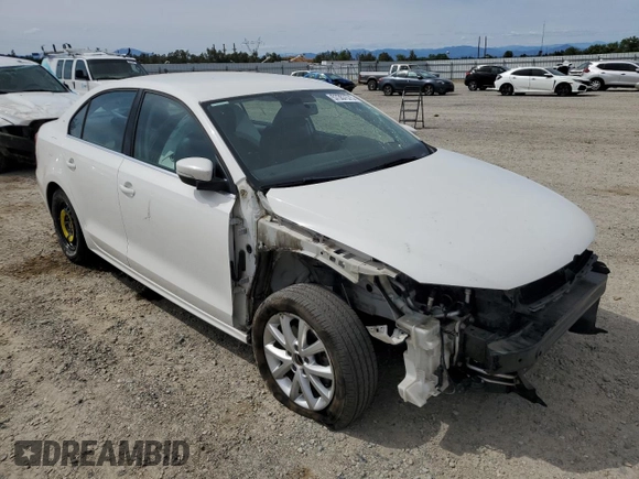 2014 Volkswagen Jetta SE with VIN 3VWD17AJ2EM391314, listed as a Copart auction lot 57357575 with 131,968 mi miles and Salvage title. Bid and sale history available at DreamBid. Image 4.
