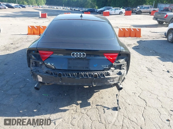 2014 Audi A7 Premium Plus z VIN WAUWGAFC4EN092525, wystawiony jako IAAI lot #42331183 z przebiegiem 183 258 mil mil oraz . Historia ofert i sprzedaży dostępna na DreamBid. Obrazek 6.