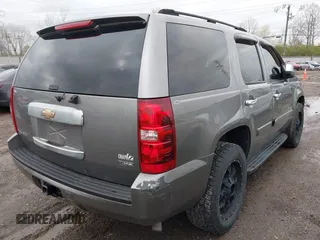 2007 Chevrolet Tahoe LT with VIN 1GNFC13077J278764, listed as a IAAI auction lot 41927809 with 211,943 mi miles and . Bid and sale history available at DreamBid. Image 4.