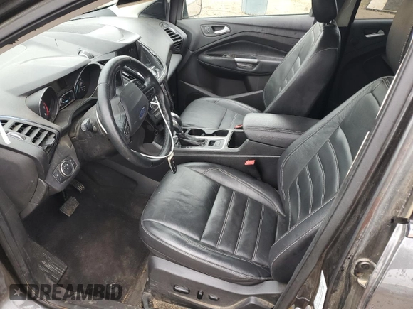 2019 Ford Escape Titanium z VIN 1FMCU9J99KUC31182, wystawiony jako Copart lot #60972815 z przebiegiem 94 464 mil mil oraz Szkoda całkowita • Salvage title. Historia ofert i sprzedaży dostępna na DreamBid. Obrazek 7.