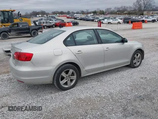 2012 Volkswagen Jetta TDI w/Premium with VIN 3VWLL7AJ2CM317216, listed as a IAAI auction lot 41731204 with 320,474 mi miles and . Bid and sale history available at DreamBid. Image 4.