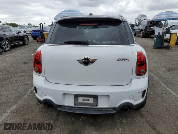 2013 MINI Countryman S with VIN WMWZC3C54DWP24877, listed as a Copart auction lot 53583655 with 97,734 mi miles and Salvage title. Bid and sale history available at DreamBid. Image 6.