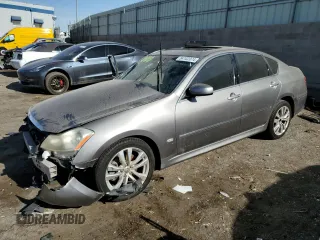 2009 Infiniti M z VIN JNKCY01E99M800056, wystawiony jako Copart lot #84102074 z przebiegiem Nie podano mil oraz Szkoda całkowita • Salvage title. Historia ofert i sprzedaży dostępna na DreamBid. Obrazek 1.