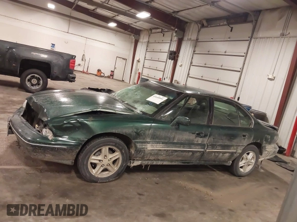 1997 Pontiac Bonneville SE z VIN 1G2HX52KXVH250272, wystawiony jako IAAI lot #41644041 z przebiegiem 160 791 mil mil oraz . Historia ofert i sprzedaży dostępna na DreamBid. Obrazek 15.