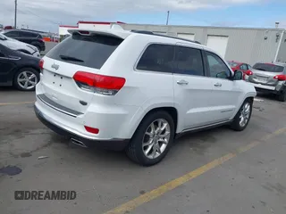 2014 Jeep Grand Cherokee Summit z VIN 1C4RJFJG2EC476114, wystawiony jako IAAI lot #42249108 z przebiegiem 97 569 mil mil oraz . Historia ofert i sprzedaży dostępna na DreamBid. Obrazek 4.