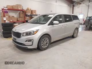 2021 Kia Sedona LX with VIN KNDMB5C18M6673537, listed as a IAAI auction lot 41248120 with 50,255 mi miles. Bid and sale history available at carsss.com. Image 2.