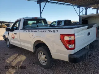 2021 Ford F-150 XL with VIN 1FTMF1C57MKE89519, listed as a Copart auction lot 49420105 with 134,507 mi miles and Salvage title. Bid and sale history available at DreamBid. Image 2.
