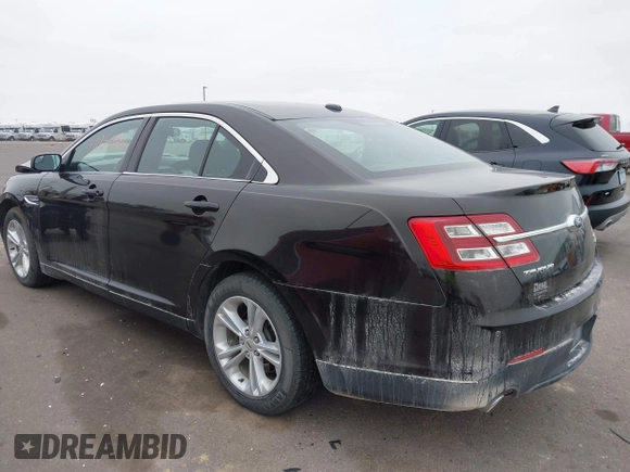 2014 Ford Taurus SEL z VIN 1FAHP2E85EG121636, wystawiony jako IAAI lot #41036886 z przebiegiem 117 460 mil mil oraz . Historia ofert i sprzedaży dostępna na DreamBid. Obrazek 3.