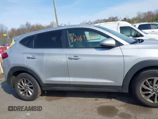 2018 Hyundai Tucson SE z VIN KM8J2CA44JU644303, wystawiony jako IAAI lot #42059326 z przebiegiem 67 873 mil mil oraz . Historia ofert i sprzedaży dostępna na DreamBid. Obrazek 13.