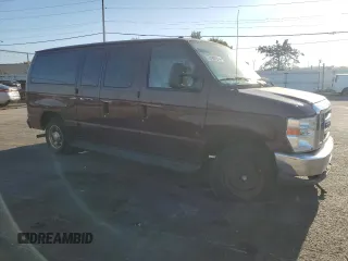 2010 Ford Econoline Passenger XL with VIN 1FMNE1BW6ADA87472, listed as a Copart auction lot 74989314 with 215,315 mi miles and Salvage Title. Bid and sale history available at DreamBid. Image 4.