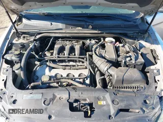 2011 Ford Taurus SE with VIN 1FAHP2DWXBG172965, listed as a IAAI auction lot 41395638 with 147,098 mi miles. Bid and sale history available at carsss.com. Image 10.
