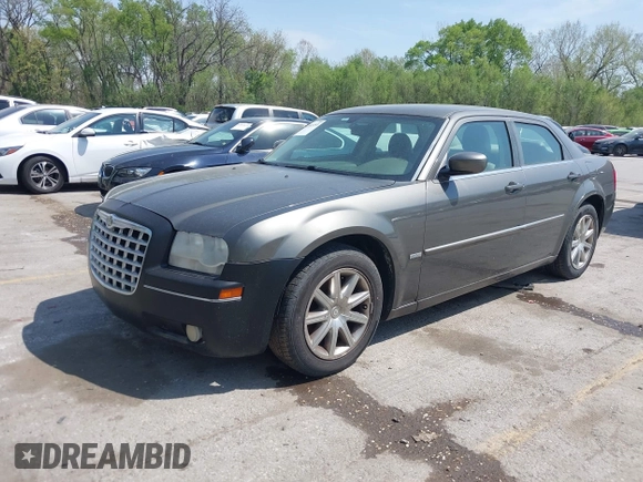 2008 Chrysler 300 Touring with VIN 2C3LA53G48H295678, listed as a IAAI auction lot 42007155 with 218,020 mi miles. Bid and sale history available at carsss.com. Image 2.