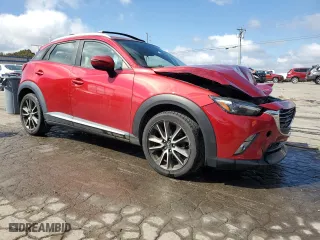 2018 Mazda CX-3 Grand Touring with VIN JM1DKFD70J0323973, listed as a Copart auction lot 73379484 with 127,773 mi miles and Salvage Title. Bid and sale history available at carsss.com. Image 4.