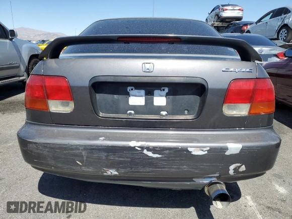1998 Honda Civic LX with VIN 2HGEJ6673WH515915, listed as a Copart auction lot 52403795 with 224,174 mi miles and Salvage Title. Bid and sale history available at DreamBid. Image 6.