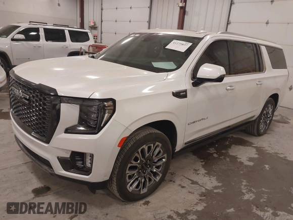 2023 GMC Yukon XL Denali Ultimate with VIN 1GKS2KKL9PR557408, listed as a IAAI auction lot 41275837 with 19,556 mi miles. Bid and sale history available at carsss.com. Image 2.