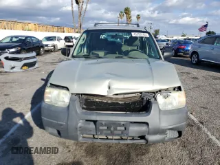 2004 Ford Escape XLS with VIN 1FMYU021X4KA41111, listed as a Copart auction lot 45393765 with 125,492 mi miles and Salvage Title. Bid and sale history available at DreamBid. Image 5.