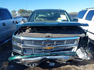 2015 Chevrolet Silverado 1500 LT with VIN 1GCRCREHXFZ267054, listed as a IAAI auction lot 41543297 with 134,087 mi miles. Bid and sale history available at carsss.com. Image 12.